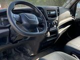 the interior of a truck with a steering wheel and dashboard