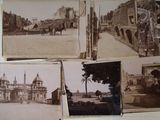 several old black and white photos of a building and a horse