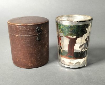 pair of antique wooden boxes and a glass with a picture of a tree