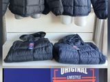 a picture of a display of jackets and jackets for sale