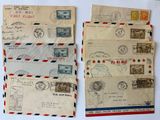 two old envelopes with stamps on them sitting on a table