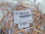 a bag of gold and silver metal pipes in a bag