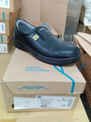 a box with a pair of shoes on top of it