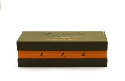 a brown box with a orange stripe on it