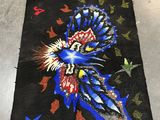a rug with a picture of a bird on it