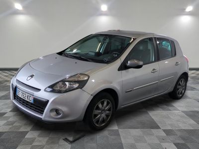 a picture of a silver car parked in a garage