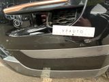 a close up of a car that has a sticker on it