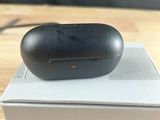 an apple airpods are sitting on top of a box on a table