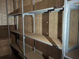 a room with a lot of shelves in it