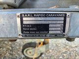 a close up of a sign on the back of a trailer