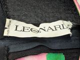 a label on the back of a dress that says les sabe