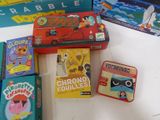 a lot of children ' s books and games on the table