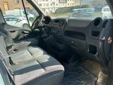 a view of the inside of a car from the driver ' s seat
