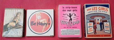 Plusieurs types de cigarettes sont alignés sur une surface rose