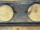 a close up of a metal object with two circles on it