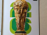 a box that has a lego head in it