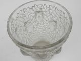 a glass bowl that is sitting on a table