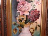 a painting of roses in a vase on a table