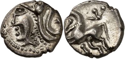 a silver coin with an image of a man and a woman on it
