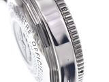 an image of a close up of a watch on a white surface