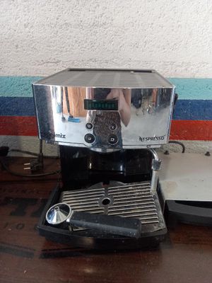 a coffee maker that is sitting on a table