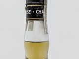 an image of a bottle of whisky sitting on top of a table