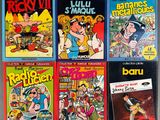 four comics are lined up on a shelf in a room