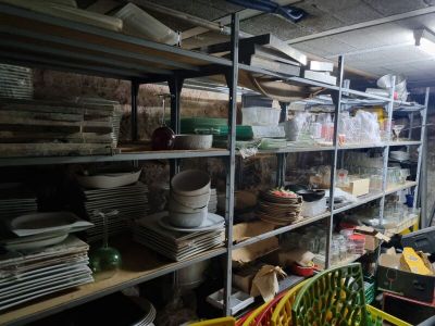 a room filled with lots of plates and bowls
