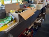 many boxes of food on the counter in the store