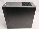 an image of a black desktop computer sitting on top of a white surface