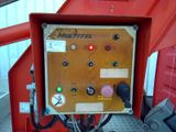 an image of a machine that is sitting on the ground
