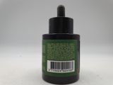an image of a bottle of black ink with a barcode label on it