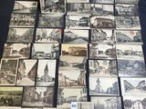 several old black and white photographs of a town and a church