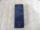 a black box on the floor with a white label on it