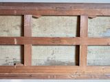 a picture of a window that has been made out of wood
