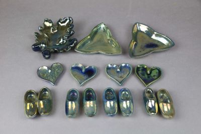 many different pieces of glass that are on the table