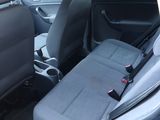 the back seat of a car with a seat belt in it