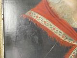 portrait d'un homme barbu portant une écharpe rouge