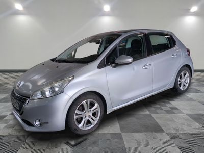a picture of a silver car parked in a garage
