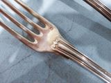 a fork and a knife sitting on a table