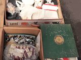 a lot of items in a box on the floor