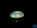 an image of a white oplite on a black background