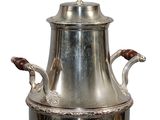 a silver vase with a handle on a white background
