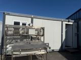 a machine that is sitting in front of a building