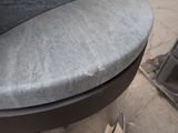 a close up of a trash can on the sidewalk
