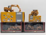 two boxes of construction vehicles are stacked on top of each other