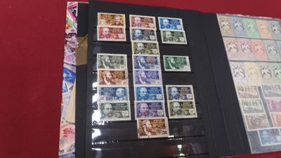 a close up of a book with stamps on it on a table