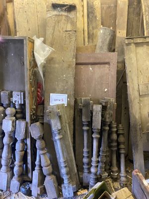 several pieces of wood are stacked on top of each other in a room