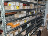many shelves with boxes on them in a warehouse