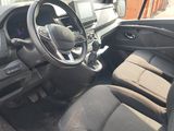 a picture of the interior of a car with a steering wheel